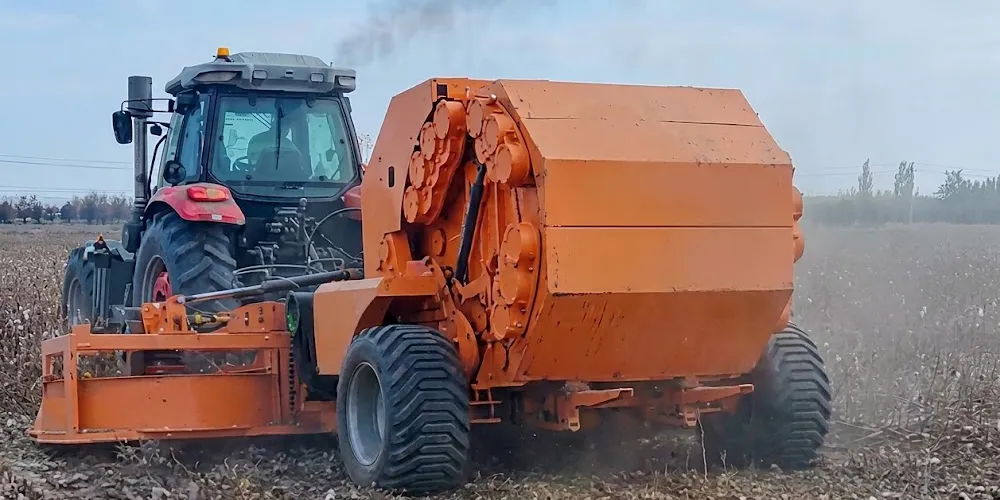 Advanced manufacturing structure of a modern round baler showcasing heavy-duty steel chassis